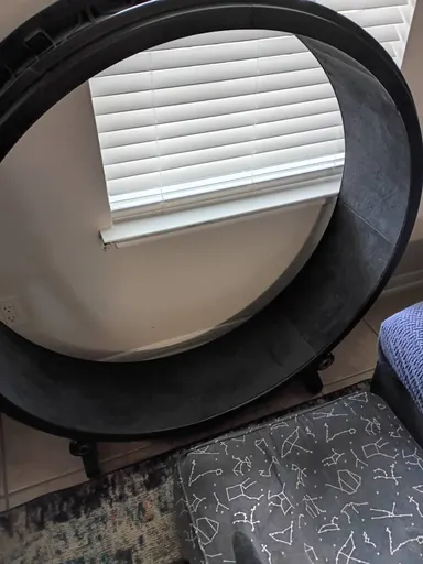 Client photo of a black pet exercise wheel