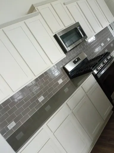 White kitchen cabinets and countertop