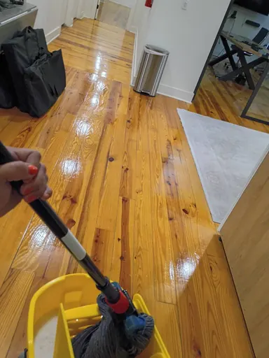 Wood floor during cleaning